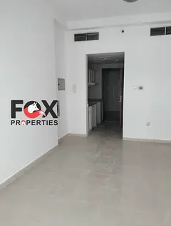 Studio for annual rent in Ajman, Al Rashidiya 1 (Pearl Towers). Great price, semi-separate kitchen,