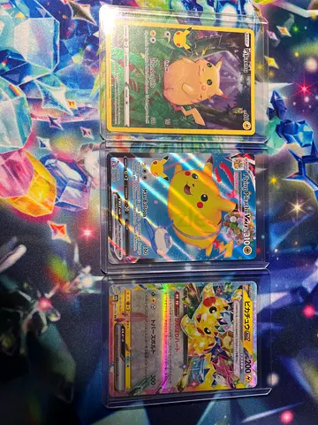 3 Pikachu cards Vmax full art and ex