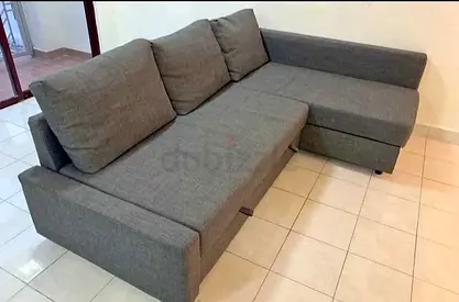 L-shaped Grey Fabric Sofa with Storage - Good Condition