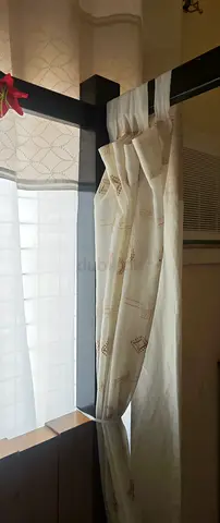 Beige patterned curtain panels (pair) - good condition
