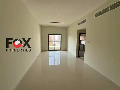 Elegant 2BHK in Nuaimiya 1 next to Al Hikma School, 2 baths, balcony, modern finishing, AED 47K yearly.