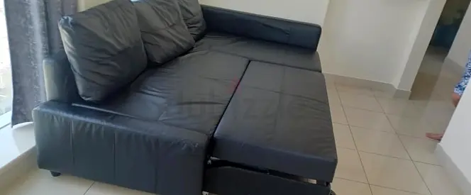 Black Leather L-Shaped Sofa Bed Good Condition