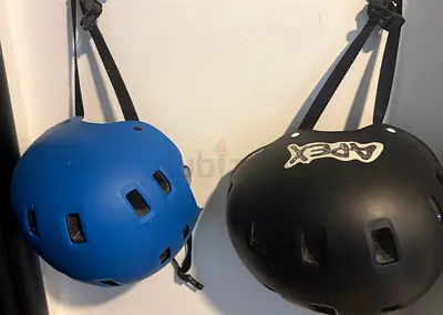 Two Oxelo protective helmets (cycling/skate) - blue and black