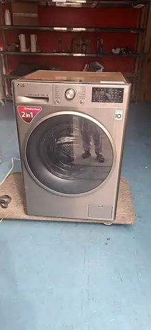 LG 2-in-1 Front Load Washer Dryer (Silver) - Good Working Condition