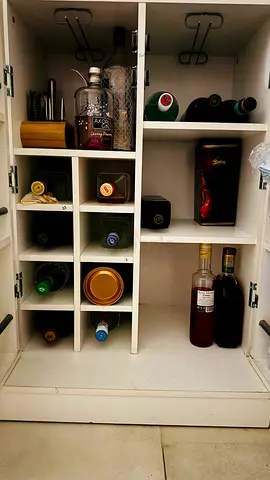 Bar cabinet along with glassware