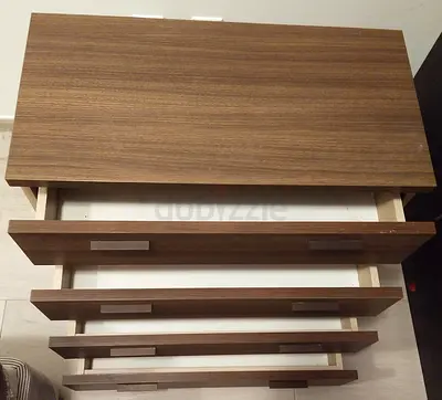 Urgent sale: Wooden 4-Drawer Chest / Dresser in Good Condition
