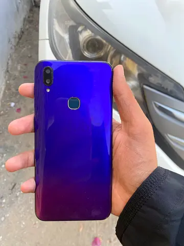 Used purple gradient smartphone with dual rear cameras and fingerprint - good condition