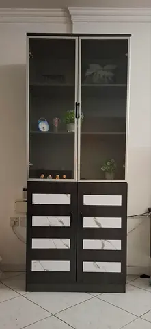 Dark wood display cabinet with glass doors and 4