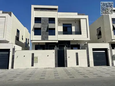 Two Villas for Sale in Ajman – Al Bahia Area Two adjacent villas for sale in a very prime location in Al Bahia, Ajman. Each villa consists of: • 5 master bedrooms • Majlis • Living room • Maid’s room