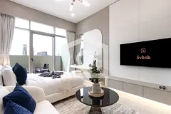Elegant Designer Studio with Balcony &amp; Rooftop Pool | JVC