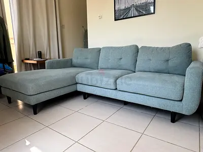 Light blue L-shaped 3-seater sofa with chaise - good condition