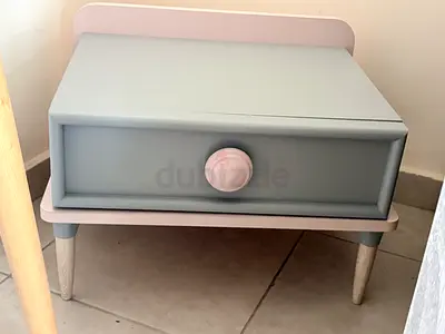 Small vintage-style bedside table with drawer