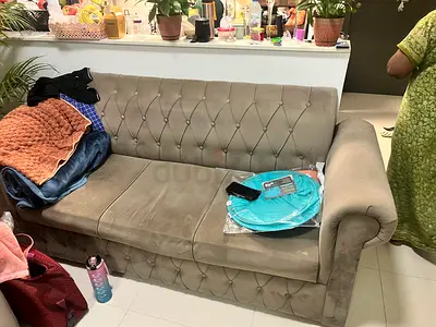 Beige tufted 3-seater fabric sofa - good condition