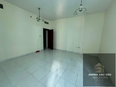 Large 1-bedroom hall for annual rent in Falcon, Al Rashidiya 2. Master bedroom, 2 bathrooms, kitche