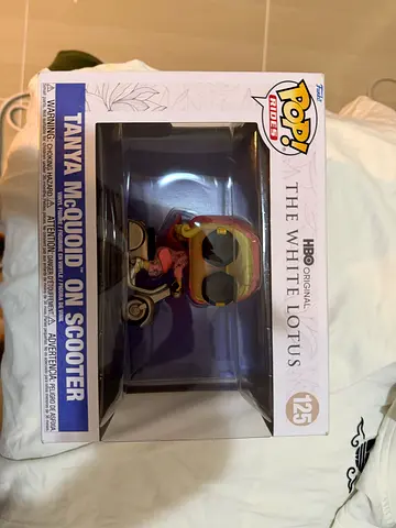 Funko Pop! Rides #125 Tanya McQuoid on Scooter (The White Lotus) - Boxed