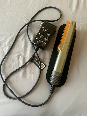 Under warranty with bill Dyson Airstrait Hair Straightener