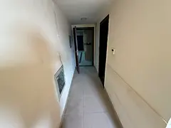 Studio for Rent in Al Rashidiya Ajman semi separate kitchen open view central AC near Falcon Towers