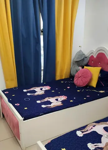 White single kids bed with pink upholstered headboard (good condition)