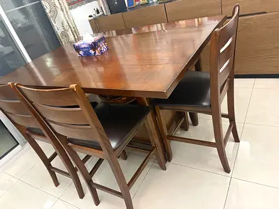 Solid Wood 5 Seater Dining Table with Chairs - Good Condition with storage options from home centre