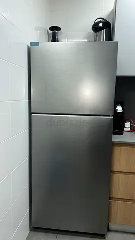 Silver double-door refrigerator - good working condition