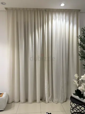 Full-length cream curtains - set of panels, like new. Multiple pannels (can buy single or multiple)