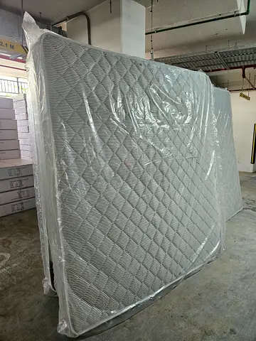 Brand new double mattress wrapped in plastic - unused