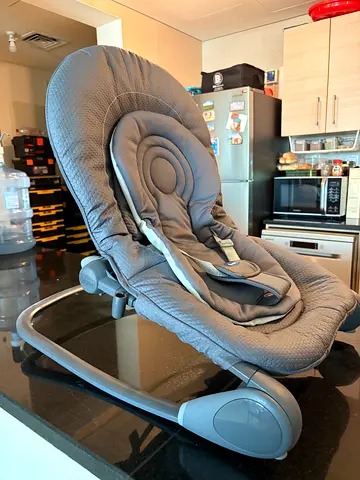 New, not used grey baby rocker / bouncer