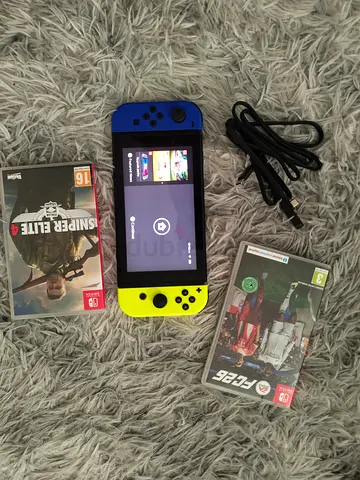 Nintendo Switch console with neon Joy-Cons + 2 games (FIFA 25, Sniper Elite 4) and charger