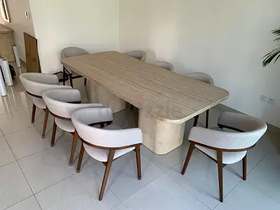 Available high quality dining table with 8 chairs like a new