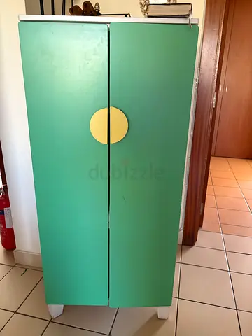 Green two-door wardrobe / armoire in good condition