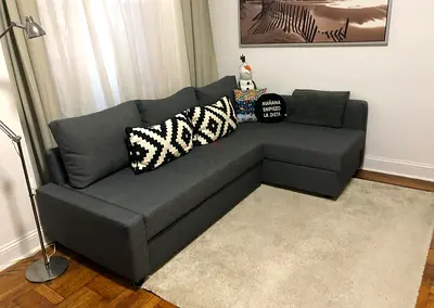 Grey L-shaped Corner Sofa bed with storage Good Condition