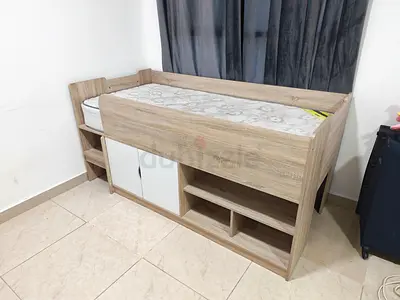 Single loft bed with built-in storage and shelves - light wood finish