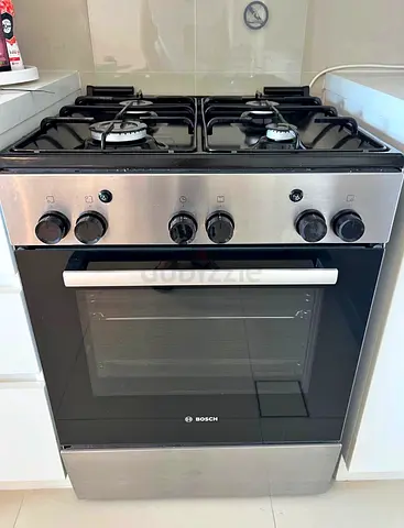 4 burner gas cooker , Bosch brand same like a new condition