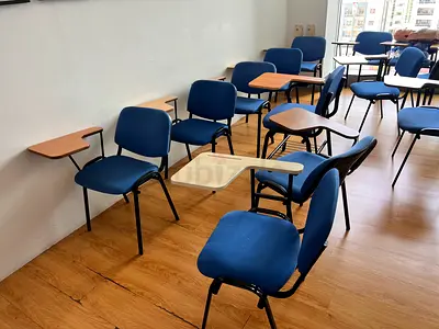 Set of 120 Blue Student Chairs with Attached Writing Tablets - Good Condition