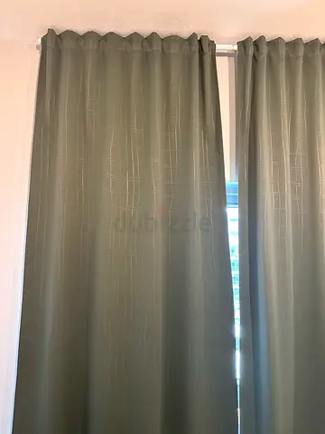 Green fabric curtains — set of blackout drapes (good condition)