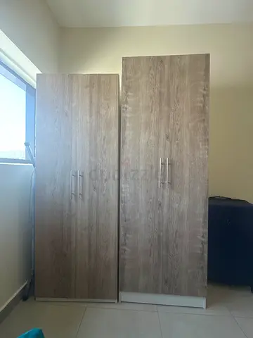Pair of wooden wardrobes / armoires in good condition
