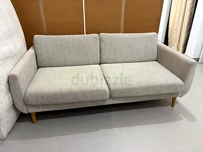 Light Grey 2-Seater Sofa with Wooden Legs - Good Condition