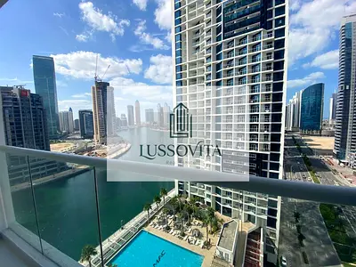 Prime Location | Fully Furnished | Spacious Layout: 2 Balcony | Burj Khalifa & Canal View