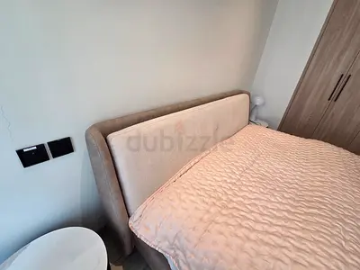 Upholstered double bed with padded headboard - good condition