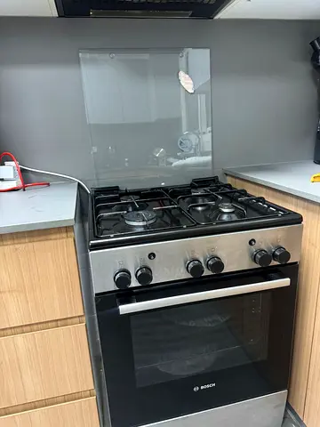 Bosch Stainless Steel Gas Cooker with Oven - Good Condition