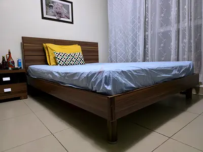 Queen size bed (with matress) + 2 side Tables for sale....In very good condition
