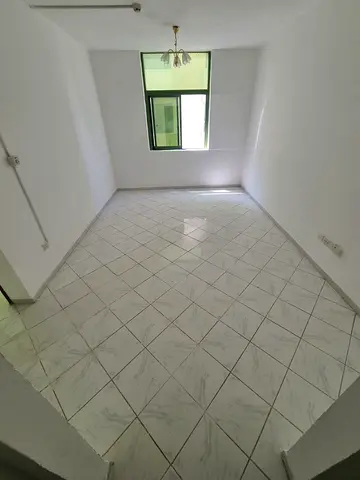 Apartment for rent Al Nabba Sharjah 1 bedroom spacious living room bathroom balcony central AC kitc
