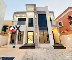 Villa for annual rent in Al Rawda 2, high-end finishing with a swimming pool and central air conditi