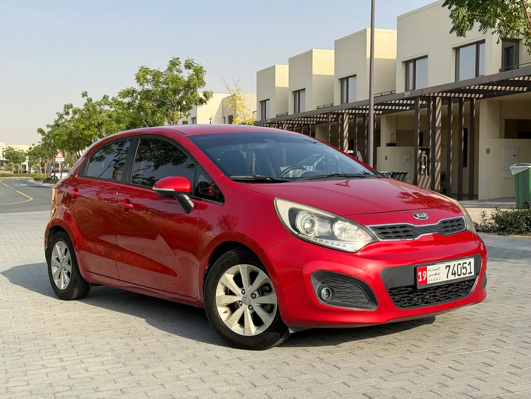Kia Rio 2014 — photo 1 of 15
