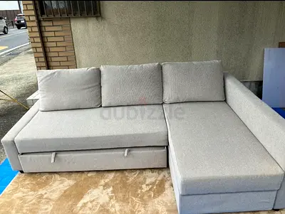 Light Grey L-Shaped Sofa with Storage and Pull-Out Bed