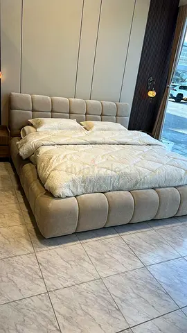 Beige Upholstered King Bed with Padded Headboard