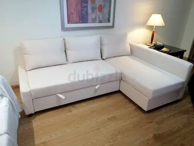 Ikea Light Beige L-Shaped Sofa with Storage and Pull-Out Bed
