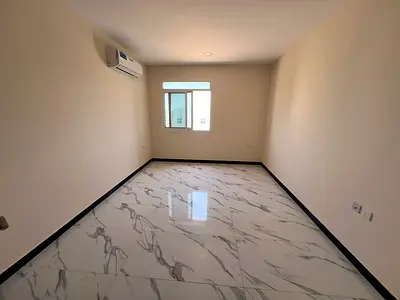 For annual rent in Al Zahia, Ajman: a new building, one bedroom and living room, two bathrooms, a large master bedroom, excellent finishing,