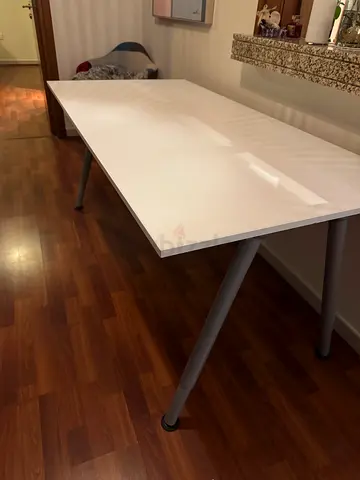 IKEA White rectangular study/office table with metal legs, adjust height. Sturdy and no scratches.