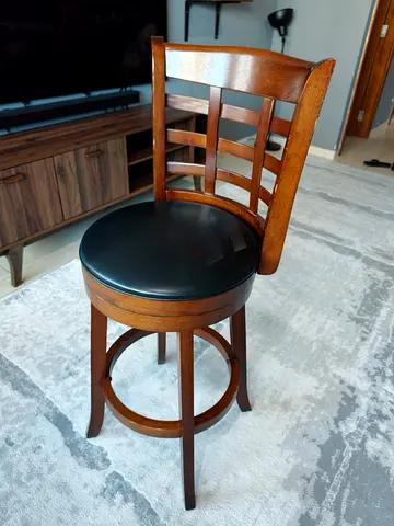 Wooden Swivel Bar Stool with Black Padded Seat - Good Condition